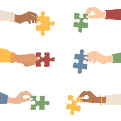 Naklejka premium Teamwork. Multi-ethnic group holding puzzles. The concept of cooperation and partnership. Flat style. Vector illustration