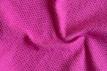  Waved ribbed cotton fabric texture pink, fuchsia , rose violet color. Close up rib cotton cloth...