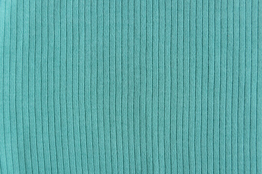  Ribbed cotton fabric texture green color  . Close up rib cotton cloth and textiles pattern. Natural organic fabrics texture background.