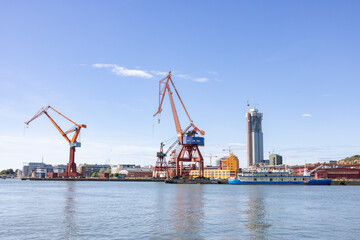 Fototapeta na wymiar Crane and Ship in Gothenburg harbour, Sweden, Scandinavia, Europe