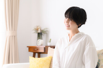 Woman relaxing in her room