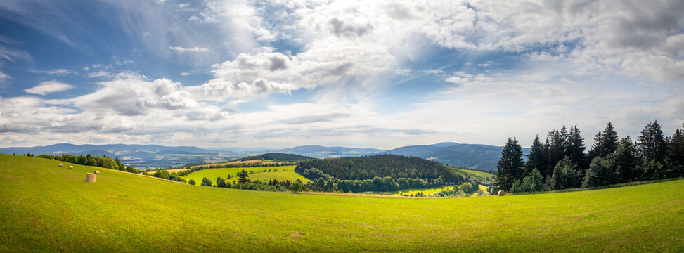 countryside landscape with hill, field and forest, Orlicke mountains, Czech republic