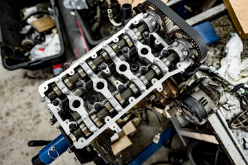 Disassembled car engine block at car service station