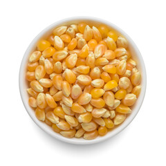 Popcorn uncooked kernels in white bowl isolated on white. Top view.