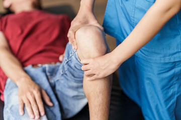 Man with joint pain, arthritis and tendon problems sees a doctor for treatment.