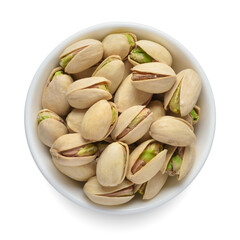 Shelled pistachio nuts in white bowl isolated on white. Top view.