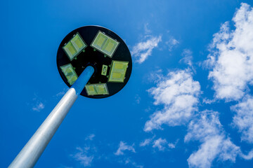 solar light blue sky background with white clouds on a clear day, Solar cell lamp, and Alternative...