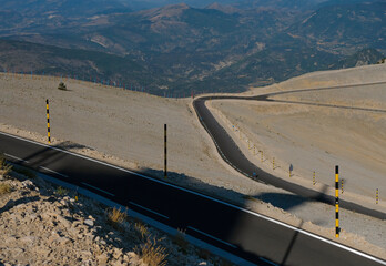 Road to Mont Ventoux, Provence, France. Mountain road marking. Shadow. Cyclists on the Road. Famous pre-alps mount. 