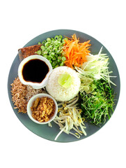 Khao Yam with Budu Sauce, a local condiment, a famous local dish in southern Thailand consisting of steamed rice, chili, various fresh vegetables, and spicy seasonings. - 531960186