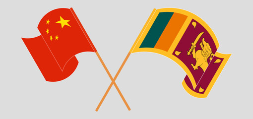 Crossed and waving flags of China and Sri Lanka