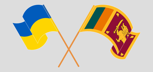 Crossed and waving flags of Ukraine and Sri Lanka
