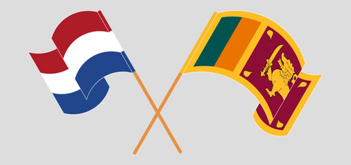 Crossed and waving flags of the Netherlands and Sri Lanka