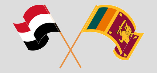 Crossed and waving flags of Yemen and Sri Lanka