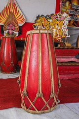 Jakarta, Indonesia, August 10 2022 : A Traditional Drum Musical Instrument named Kendang, gendang, with red color standing