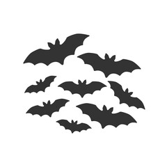 Fototapeta premium Flock of bats. Halloween symbol. Black flying bats. Horrific flying foxes