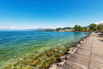 Coast of Lake (Lago di Garda) near the small town of Bardolino, tourist resort in Verona province,...