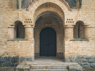 Fototapeta na wymiar Old church, church entrance, old steel gates,