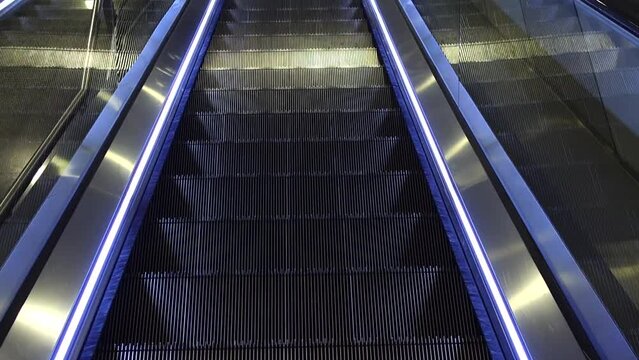 Movement of the escalator. Shooting in motion.
