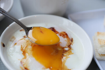 Fried eggs in the plate close up ,