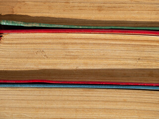 Macro textures of old hardcover books with yellowed pages