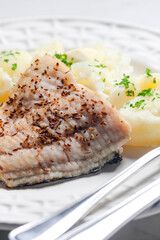 pike perch on cumin with cooked potatoes