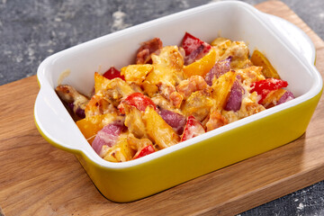 roasted vegetables with meat and cheese