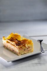 lasagne with salmon, bechamel and parmesan cheese
