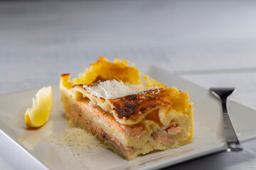 lasagne with salmon, bechamel and parmesan cheese