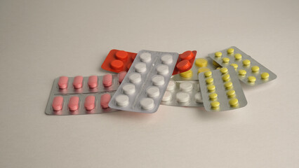 Tablets in blister packs, packs of pills.