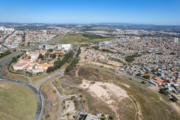 Aerial view of Parque Oziel neighborhood (also known as Jardim Monte Cristo) in Campinas, São Paulo. Poor community with wooden houses, garbage and vegetation in its surroundings.