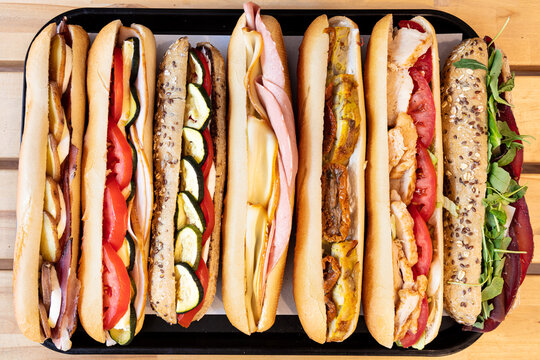 baguette, composizione, farcitura, street-food, street, strada,  alimento, pane, Prosciutto Crudo, prosciutto, Rucola, Bresaola, Salmone, Melanzane Grigliate, Multicereali, Speck, formaggio, mozzarell