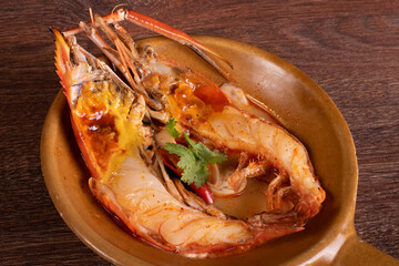 Tom yum kung. Thai food style Seafood Hot Pot.  spicy Thai food concept.