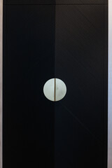 stylish black wooden door with metal handles