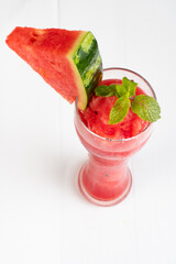 watermelon juice isolated on a white background with melon slice