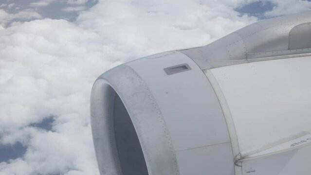 View from in side plane cabin through plane window see plane's engine