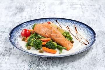 salmon steak with roasted vegetables
