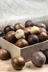 Close-up of macadamia nut with selective focus on the wooden table in Brazil