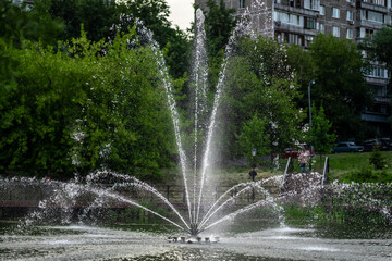 Beautiful fountain on the city pond Moscow Russia 2022