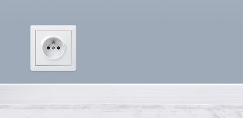 White power outlet isolated in wall