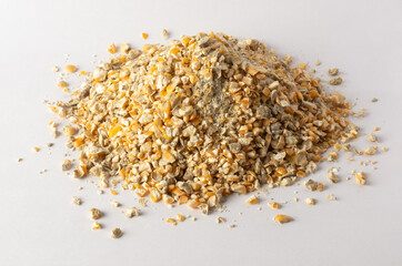 pile of chicken scratch, chicken feed consists of cracked corn with other grains which is a great...