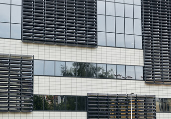 Exterior facade blinds of modern building. Modern architectural view of the wall.