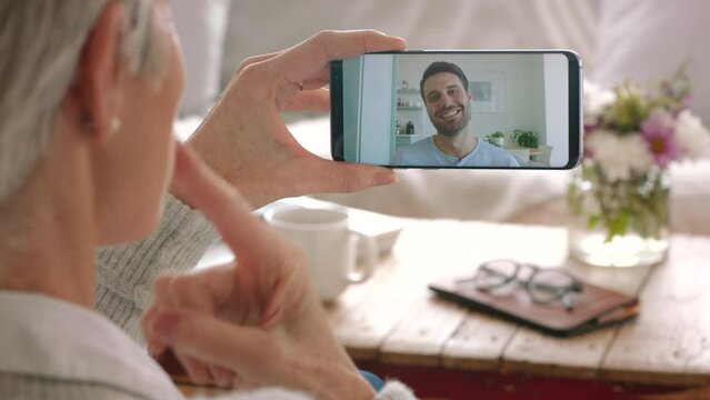 Sign language, deaf man on video call phone and talking on mobile communication, virtual network on screen. Online wave to senior grandma, hand gesture speaking and i miss you to family and friends