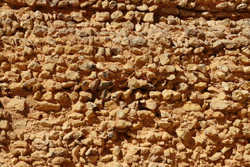 Mur de pierres de l'époque Romaine. Texture, arrière-plan.