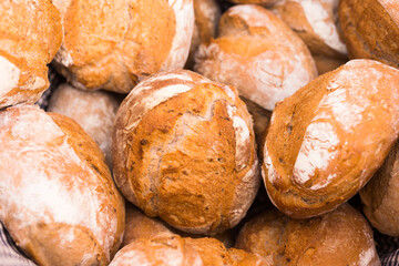 ruddy rolls of fresh warm grain bread