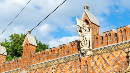 Fototapeta na wymiar Figure of the knight Friedrich von Zollern on the facade of the Friedland Gate, Kaliningrad, Russia