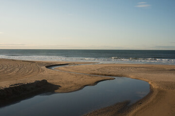 A beautiful shot of the sandy shore in the Atlantic ocean