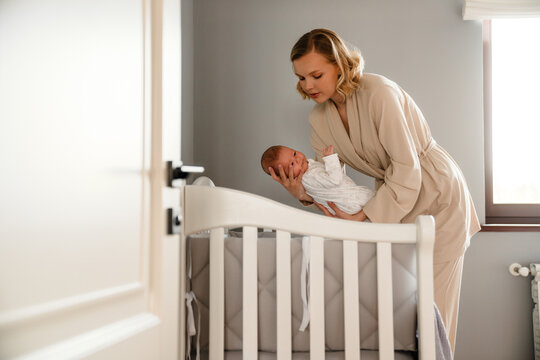 Putting newborn in crib hotsell