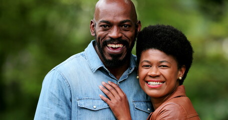 Happy Black couple smiling, two African people together portraits