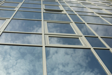Windows in building. Mirror surface in building.