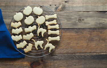 Baked cookies for Halloween. Cookies in different shapes. Copy space.